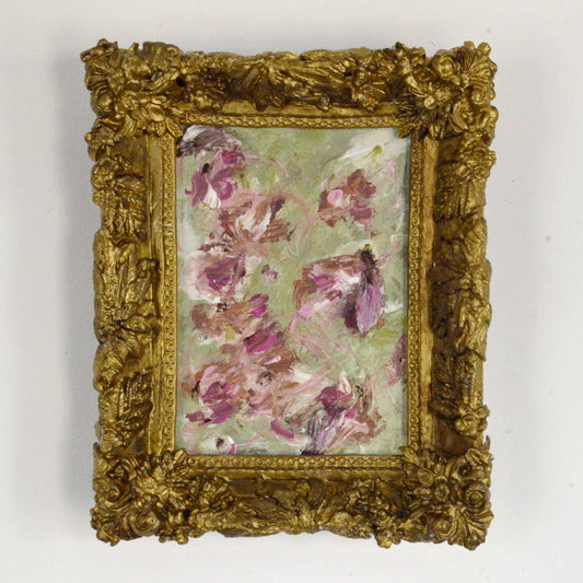 Framed artwork with floral design on a white background
