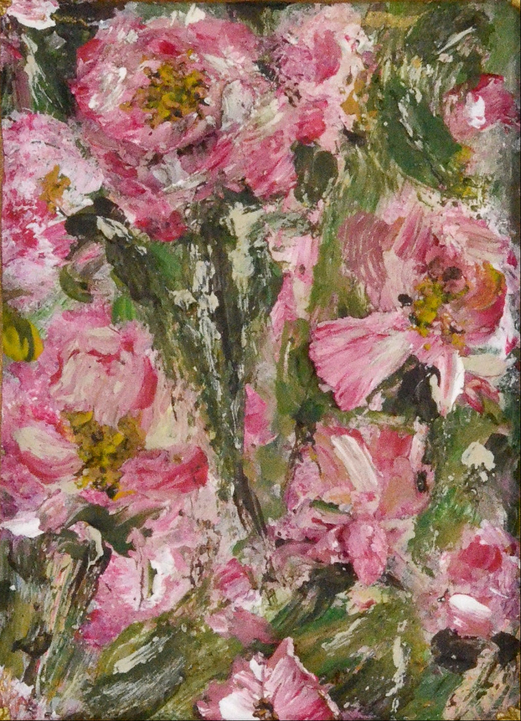 Decorative gold frame with a floral painting on a white background