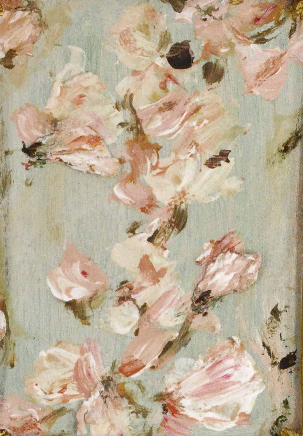 Decorative gold frame with a floral painting on a white background