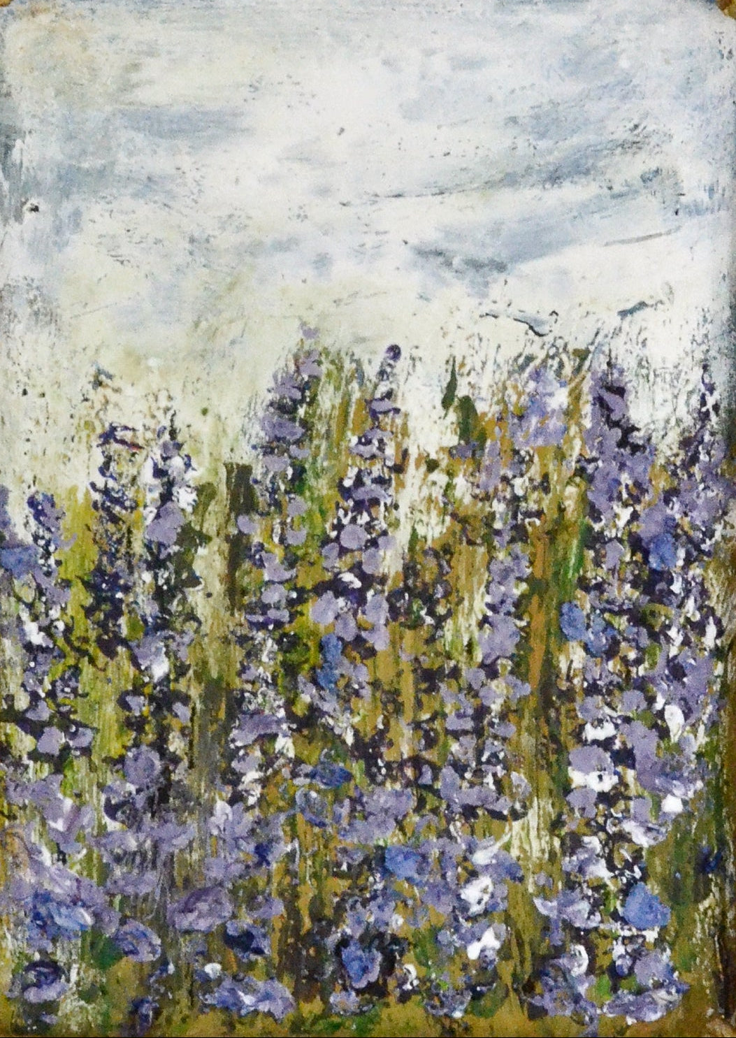 Decorative gold frame with a painting of flowers on a white background