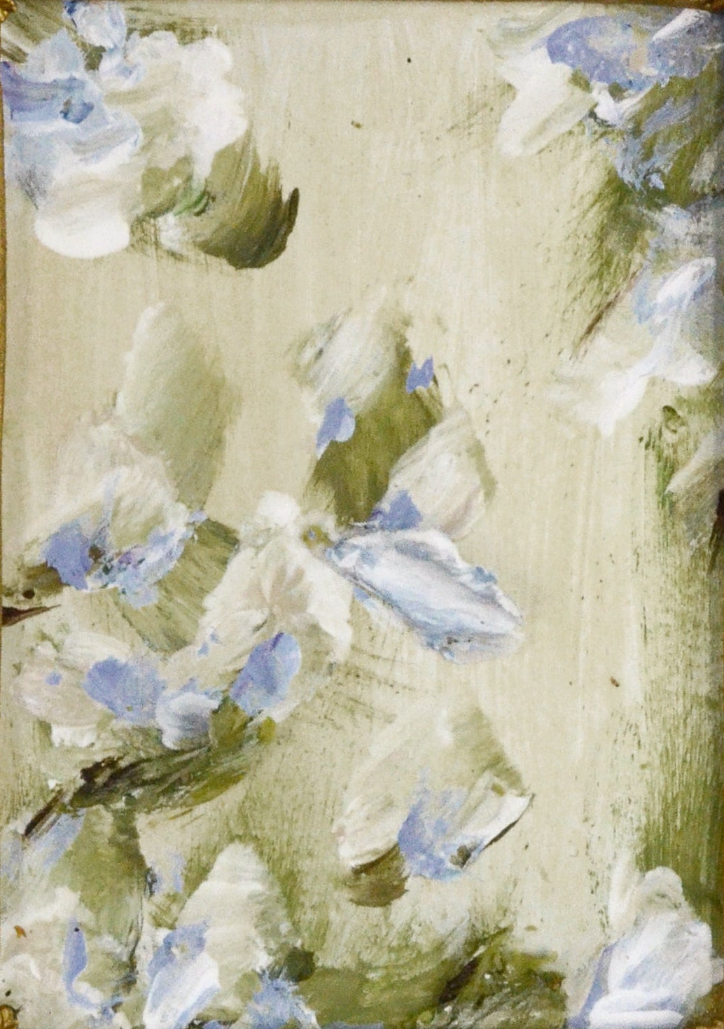 Decorative gold frame with a floral painting on a white background