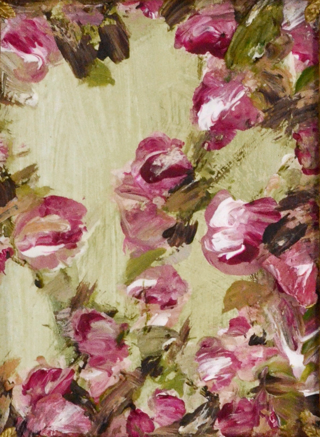 Decorative gold frame with floral design on a white background