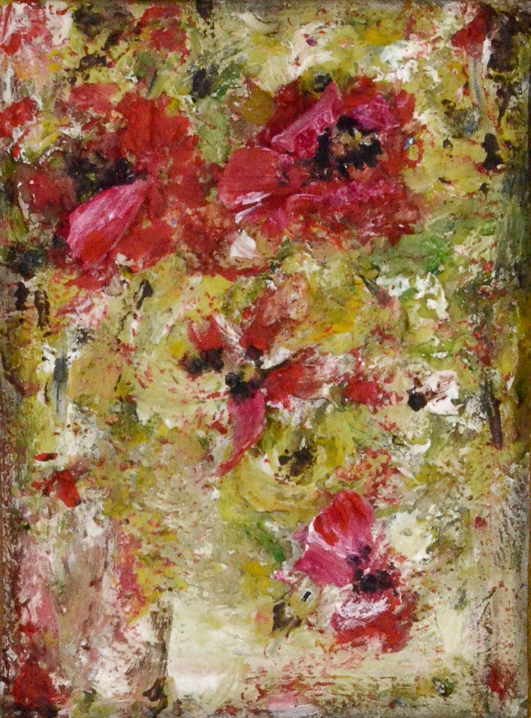 Floral painting in a gold frame on a white background